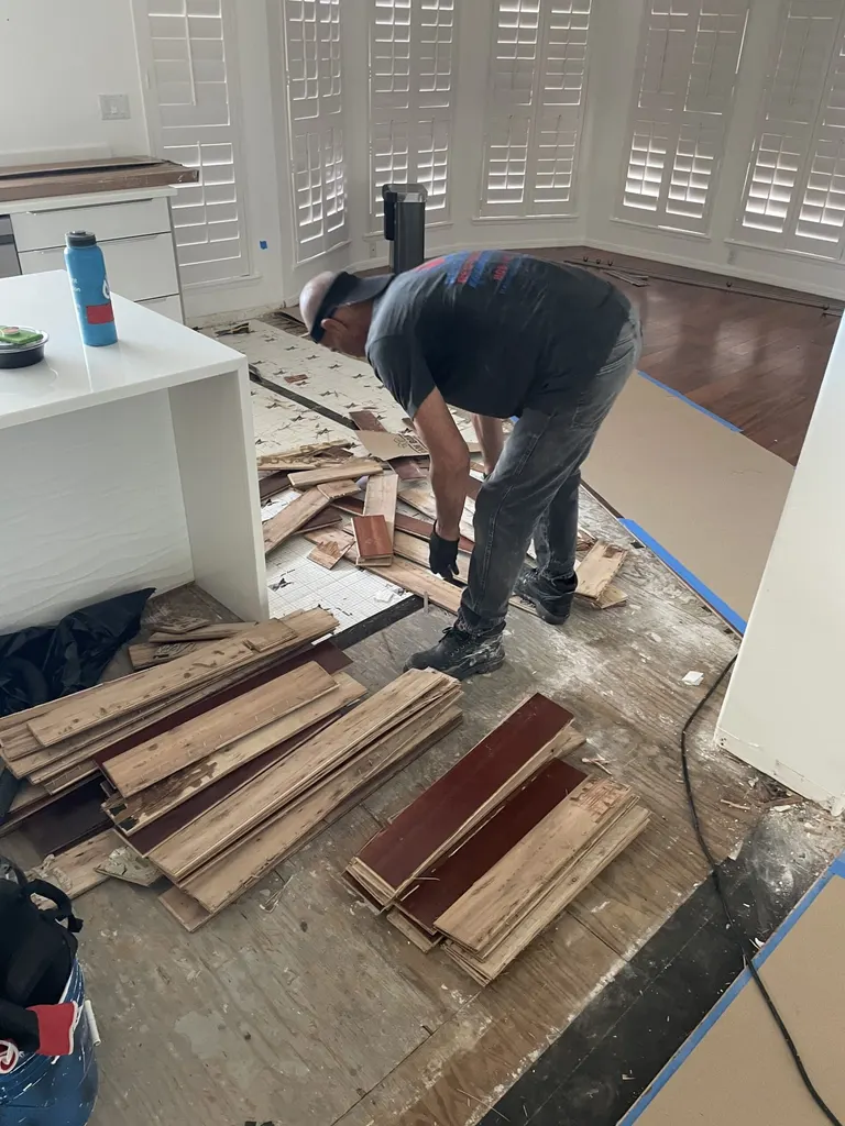 Wet flooring lifted so the subfloor can dry.